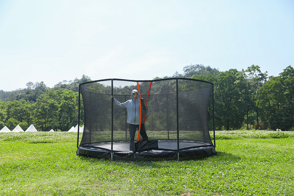 Ground-level safety net trampoline for neighborhood community park - family recreation zone