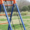 2‑Seat Metal Swing Set with Dual‑Side Climbing Frame